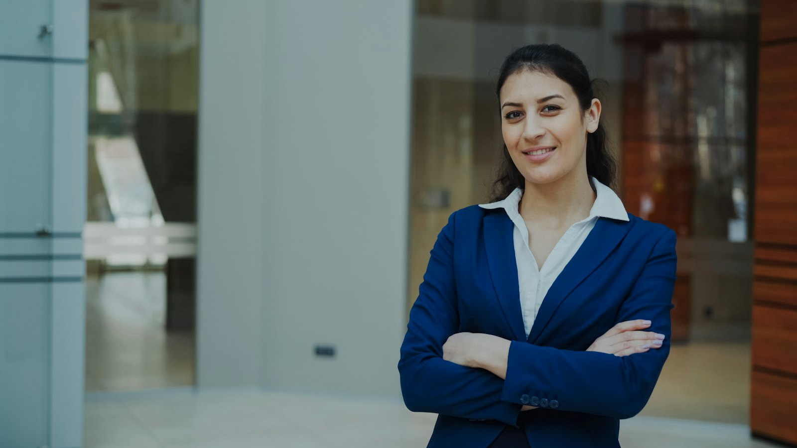 Confident professional smiling in an office